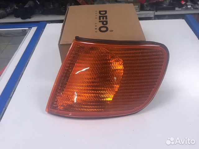 4411509luey Поворотник левый желтый Audi 100 90-94