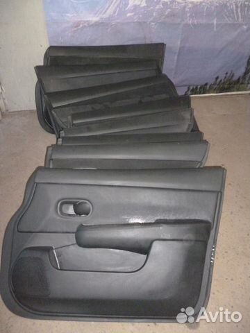Nissan tiida обшивка двери комплект Nissan tiida обшивка двери комплект