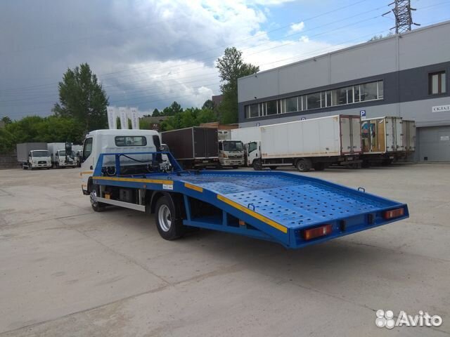 Эвакуатор с платформой Fuso Canter TF