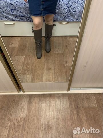 Новые кожаные сапоги