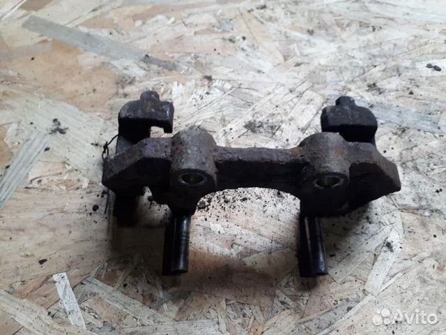 Скоба суппорта переднего Opel Vectra B 99-02