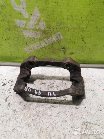 Скоба суппорта переднего Ауди 80 90 Б3