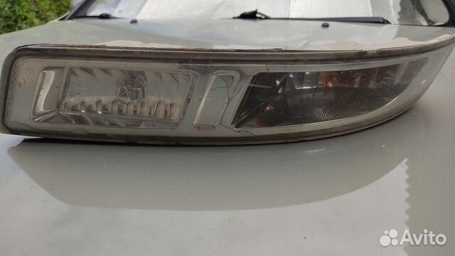 Поворотник левый Nissan Almera Classic