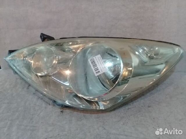 Фара левая H005 Nissan Note E11 брак крепления