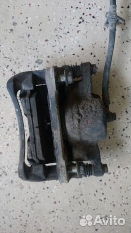 Супорт тормозной передний Хонда Рафага