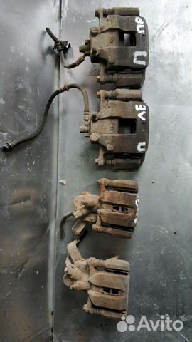 Передний тормозной суппорт Suzuki SX4 седан