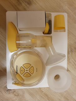 Молокоотсос Medela swing + в подарок 3 бутылочки