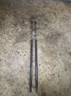 Амортизатор крышки багажника Nissan Note E11