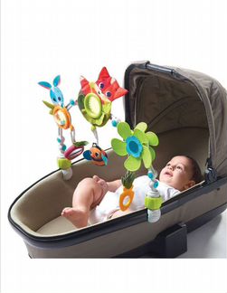 Дуга с игрушками на коляску tiny love