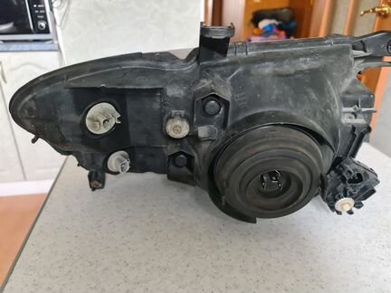 Оригинальные фары Mitsubishi pajero 3 2006